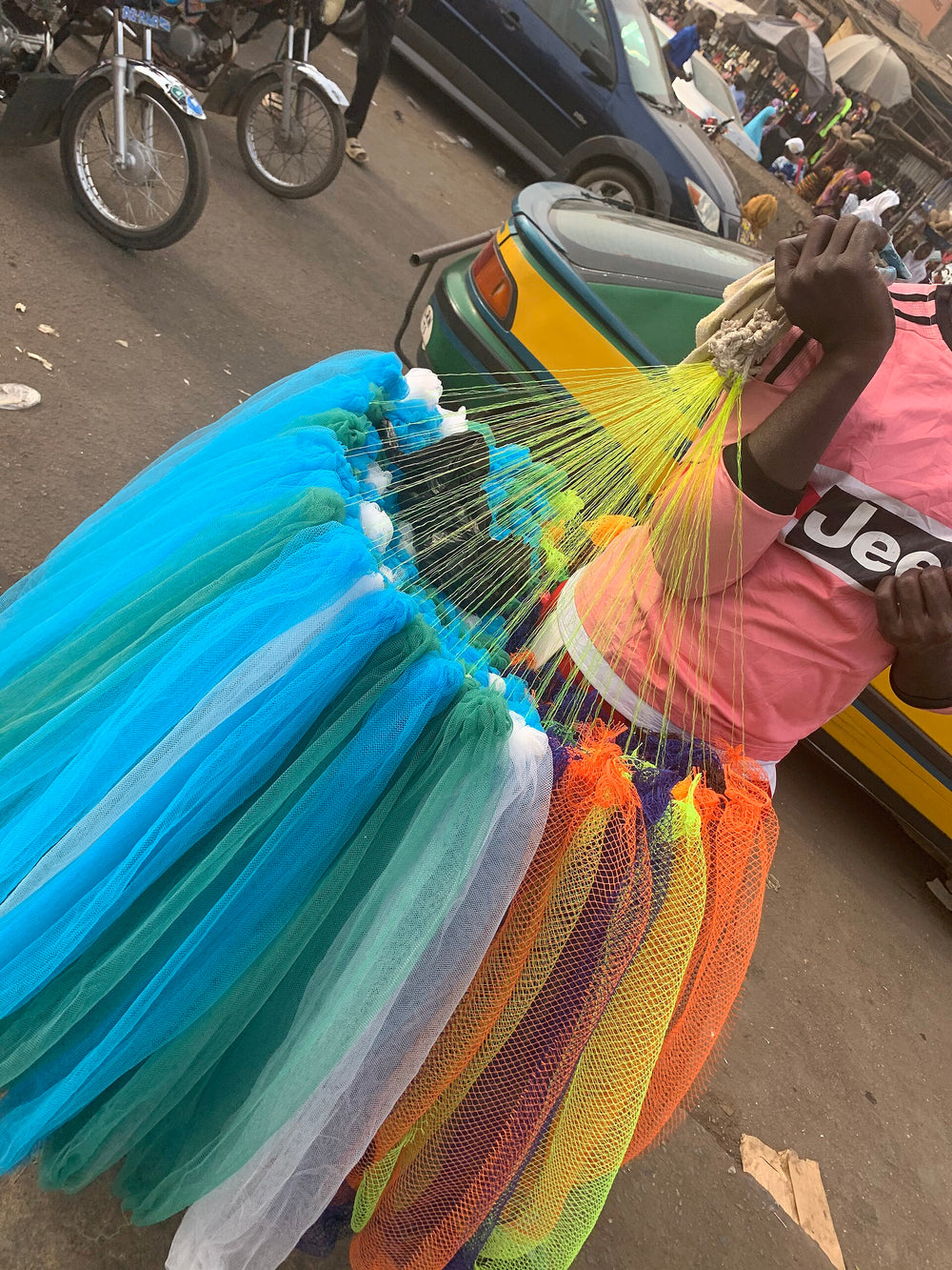 African net sponges hanging at a Nigerian market